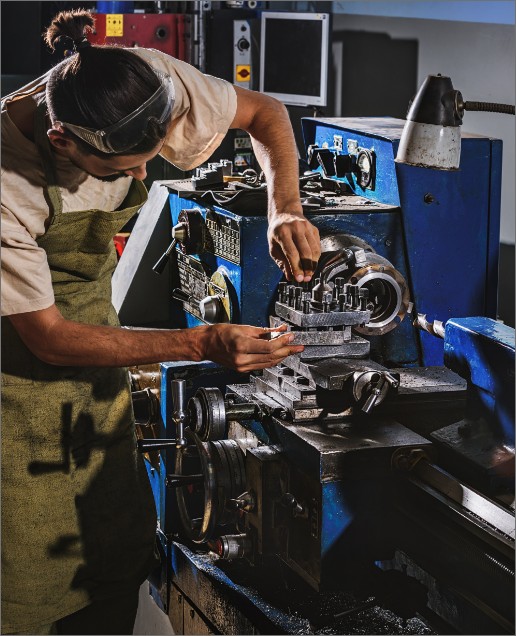 A man working in a machine shop.